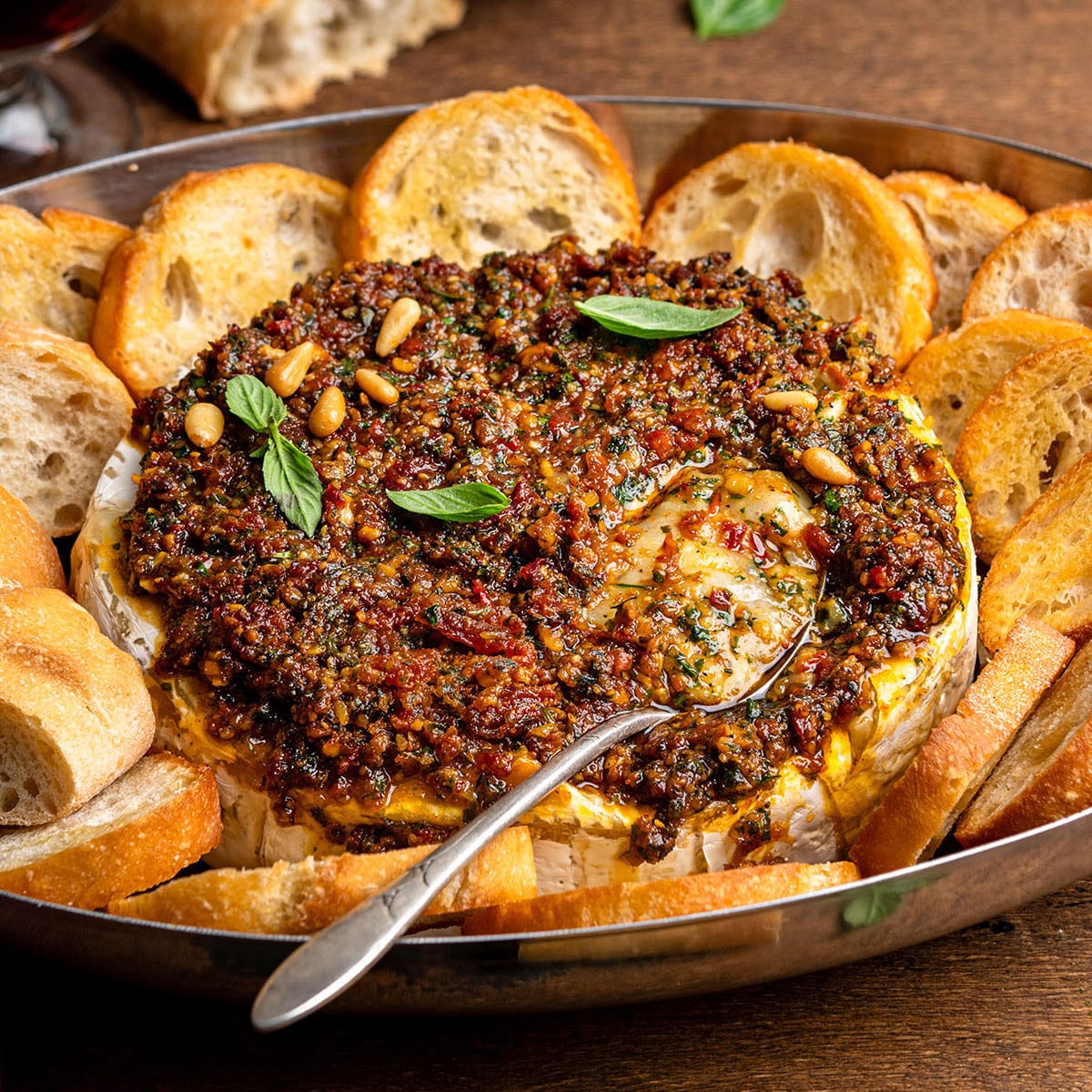 Savory Baked Brie with Sun-Dried Tomato Pesto