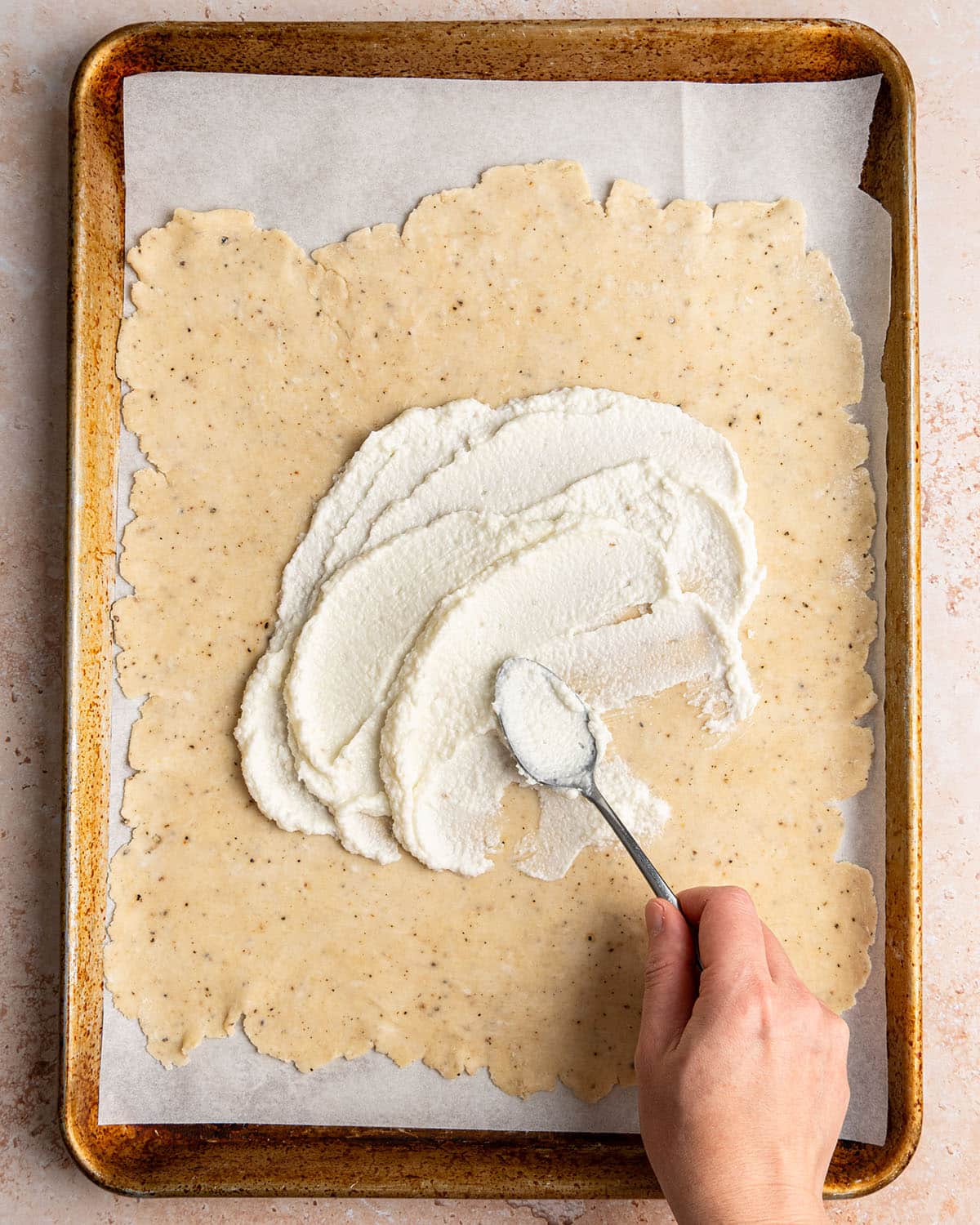 spread toum on dough