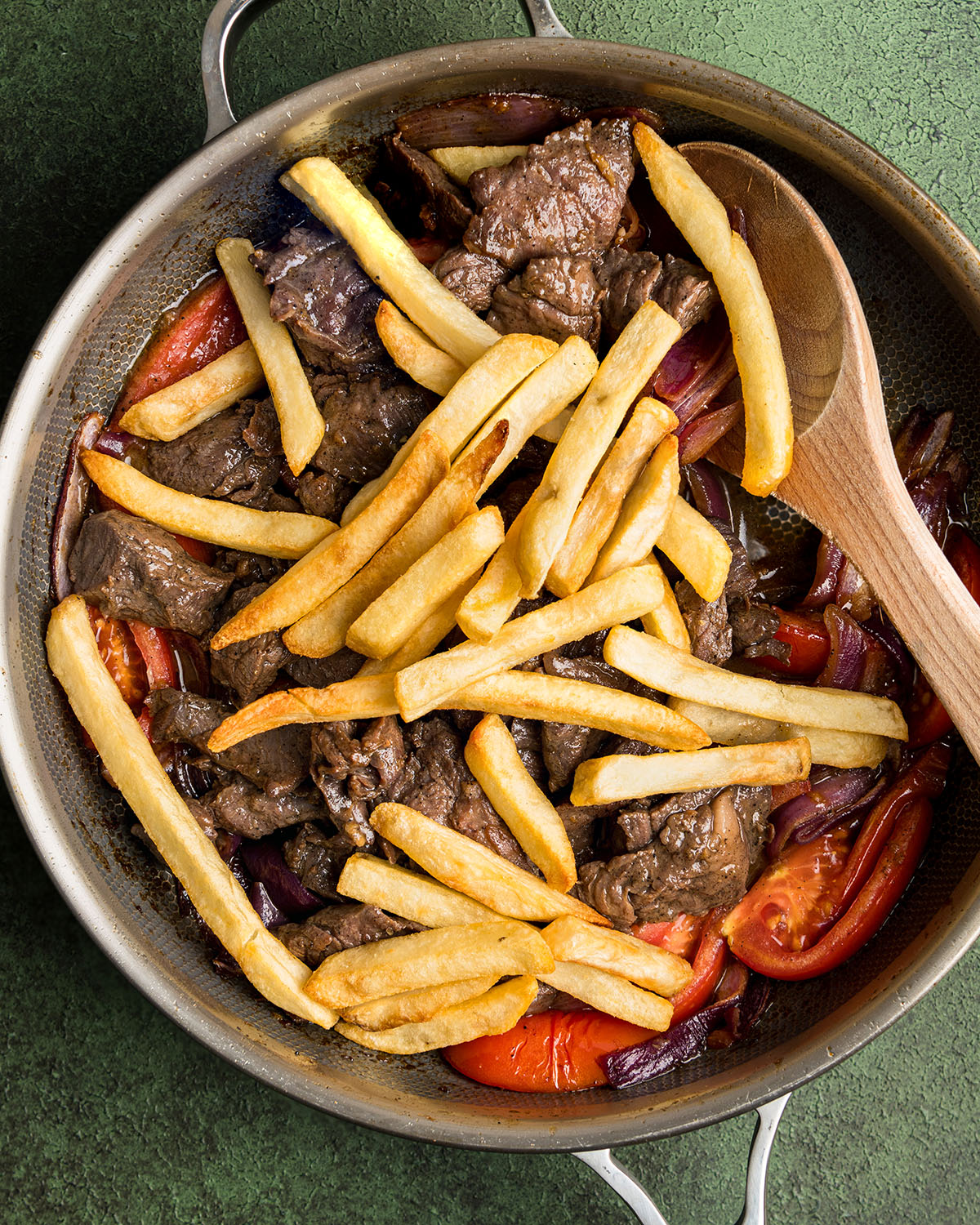 add beef and fries to stir-fry