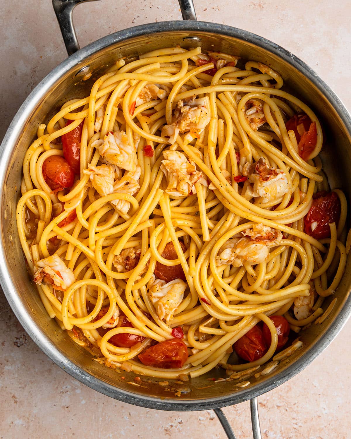 add pasta and lobster to sauce