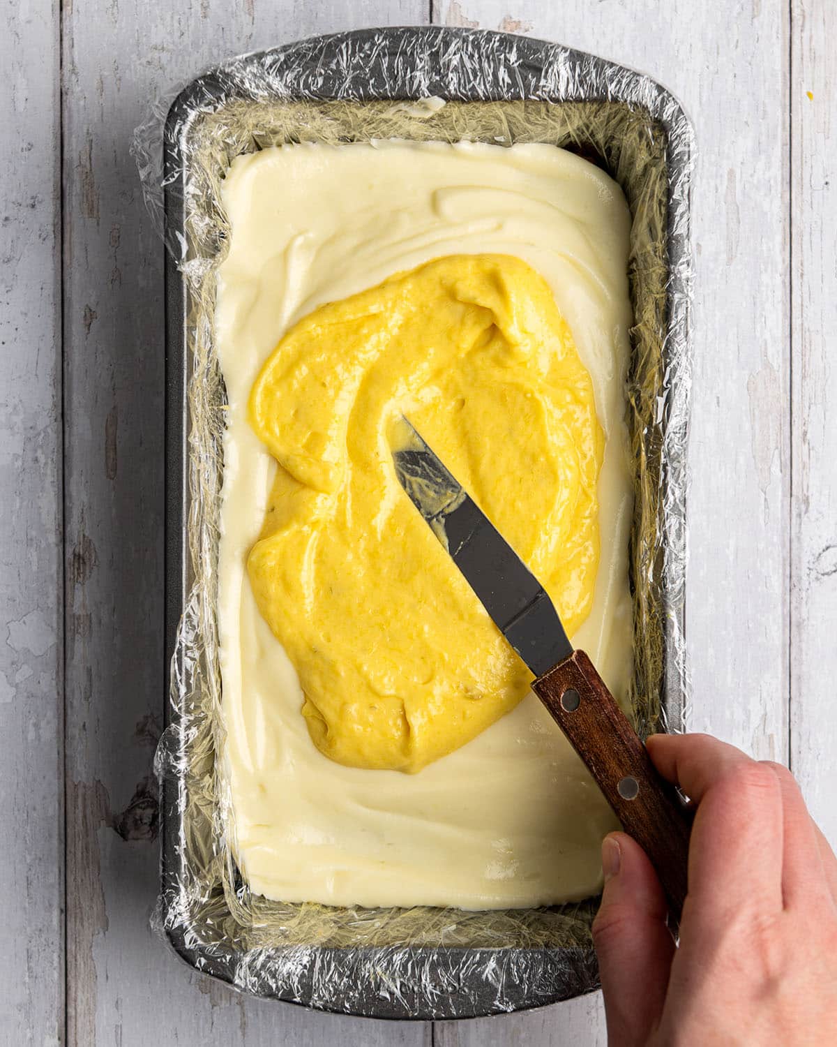 spread mango filling on coconut filling