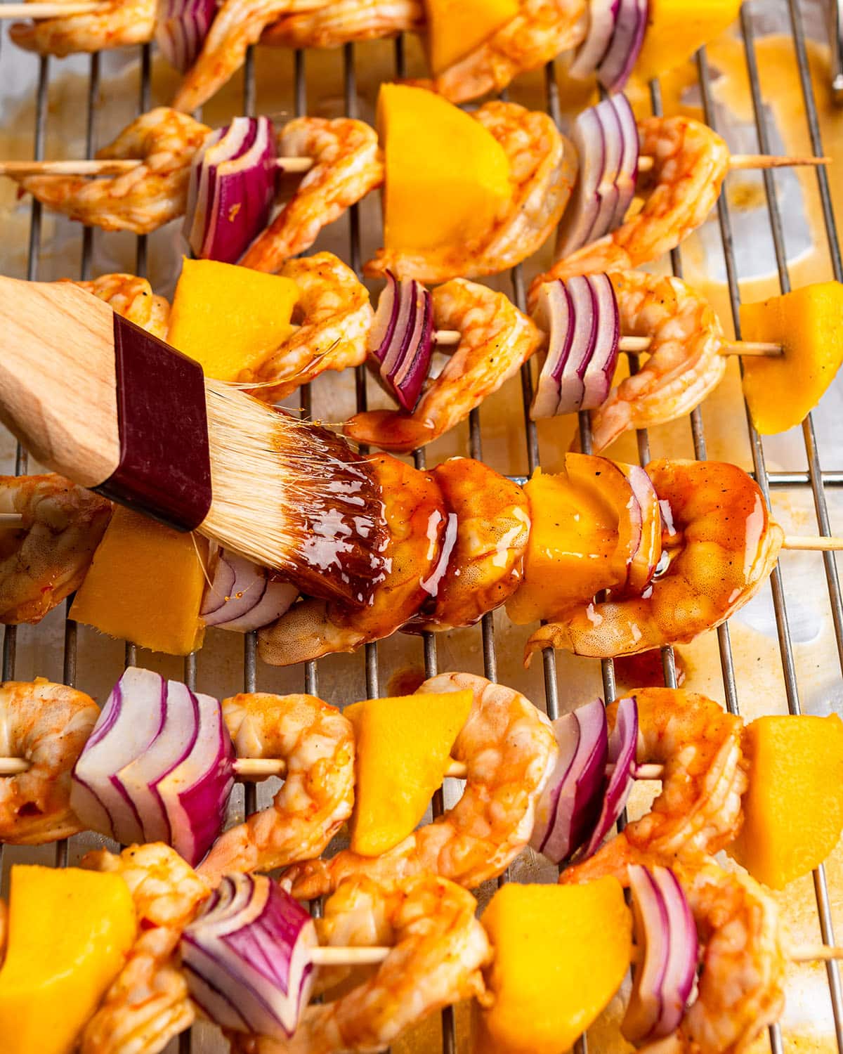 baste skewers with sauce